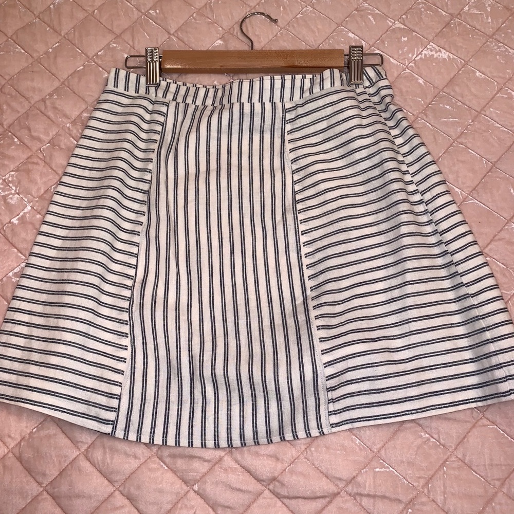 Cooperative Brand white skirt with blue stripes.